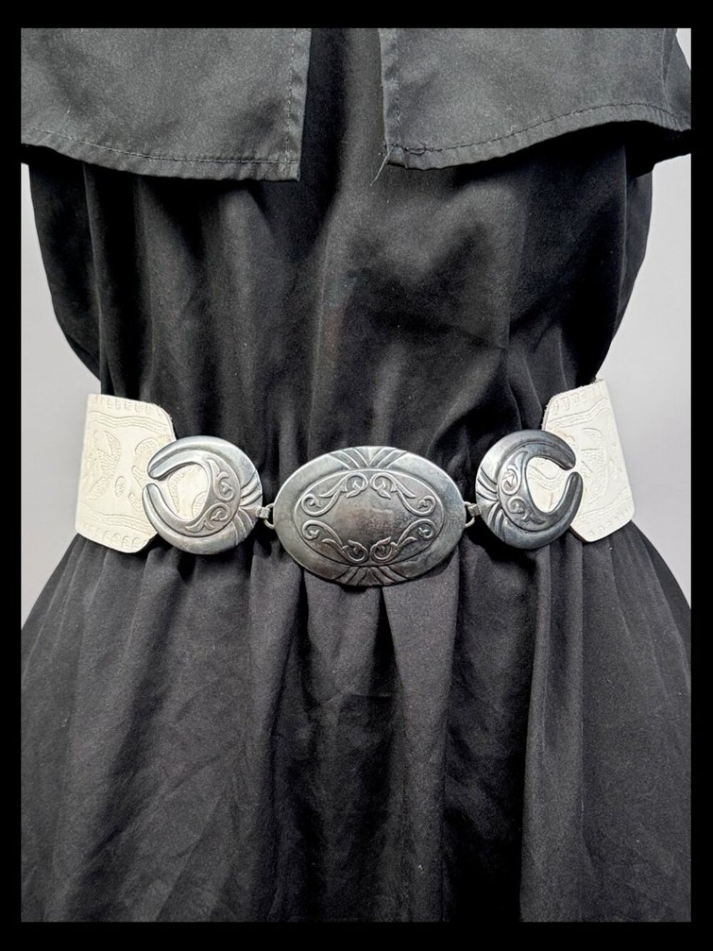 Vintage wide embossed leather cinch belt with silver concho hardware